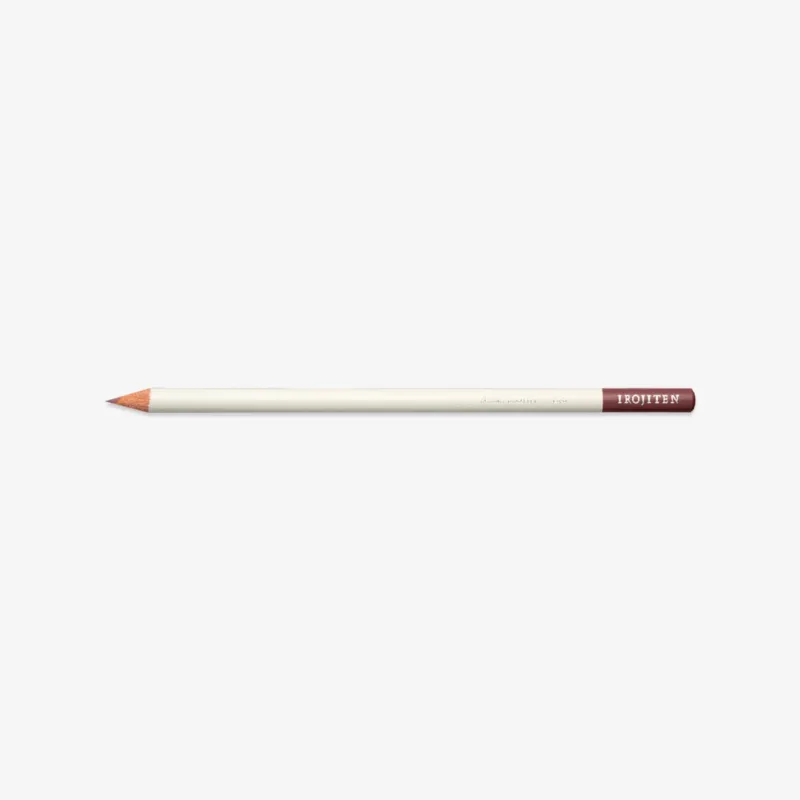 White pencil with brown tip on a white background